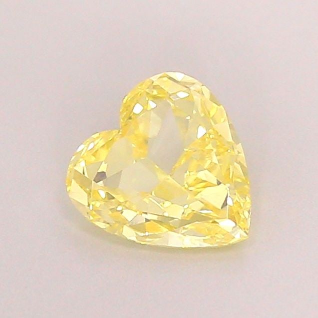 Loose Diamond - HEART 0.72ct Fancy Yellow VS1: Loose Diamond - HEART 0.72ct Fancy Yellow VS1 Source: This is a real non-mined Diamond that has been grown in a lab Shape: HEART Carats: 0.72 Color: Fancy Yellow Certification: IGI Video: