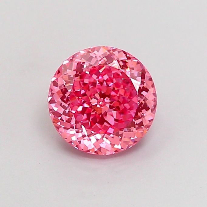 Loose Diamond - ROUND 1.47ct Fancy Vivid Pink VS1: Loose Diamond - ROUND 1.47ct Fancy Vivid Pink VS1 Source: This is a real non-mined Diamond that has been grown in a lab Shape: ROUND Carats: 1.47 Color: Fancy Vivid Pink Certification: IGI Video: