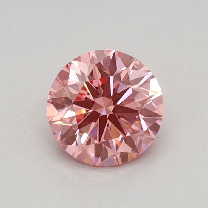 Ideal Loose Diamond - ROUND 0.4ct Fancy Vivid Pink VS1: Ideal Loose Diamond - ROUND 0.4ct Fancy Vivid Pink VS1 Source: This is a real non-mined Diamond that has been grown in a lab Shape: ROUND Carats: 0.4 Color: Fancy Vivid Pink Certification: IGI Video: