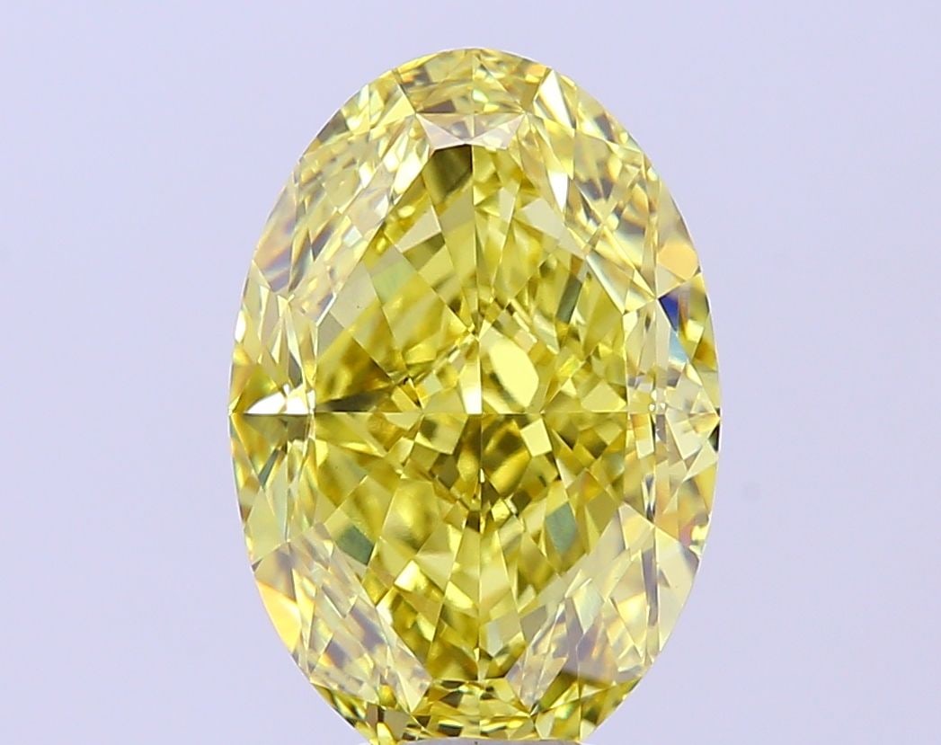 Loose Diamond - OVAL 8.56ct Fancy Vivid Yellow VVS2: Loose Diamond - OVAL 8.56ct Fancy Vivid Yellow VVS2 Source: This is a real non-mined Diamond that has been grown in a lab Shape: OVAL Carats: 8.56 Color: Fancy Vivid Yellow Certification: IGI The Diam