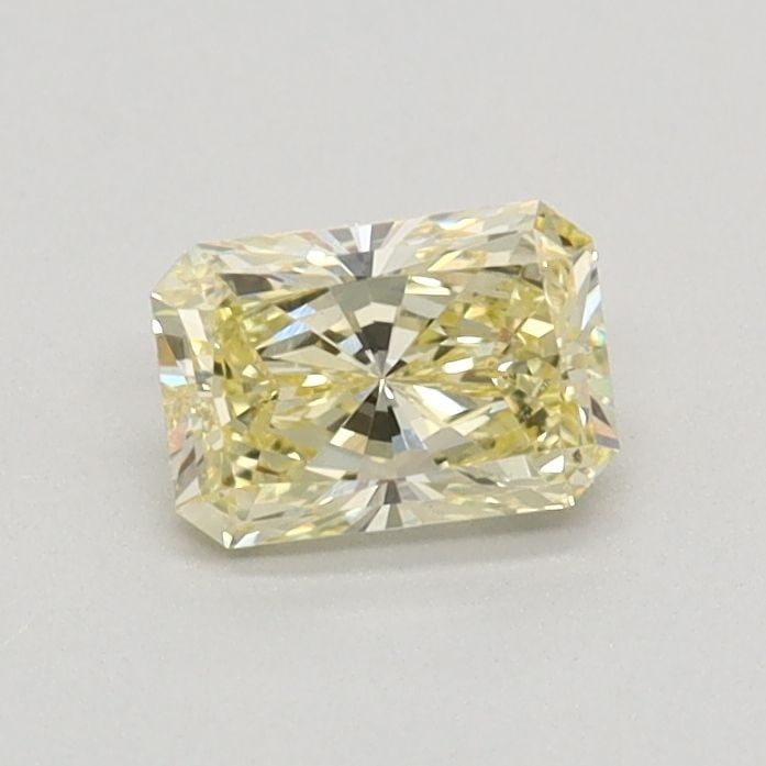 Loose Diamond - RADIANT 0.41ct Fancy Yellow VVS2: Loose Diamond - RADIANT 0.41ct Fancy Yellow VVS2 Source: This is a real non-mined Diamond that has been grown in a lab Shape: RADIANT Carats: 0.41 Color: Fancy Yellow Certification: IGI Video:
