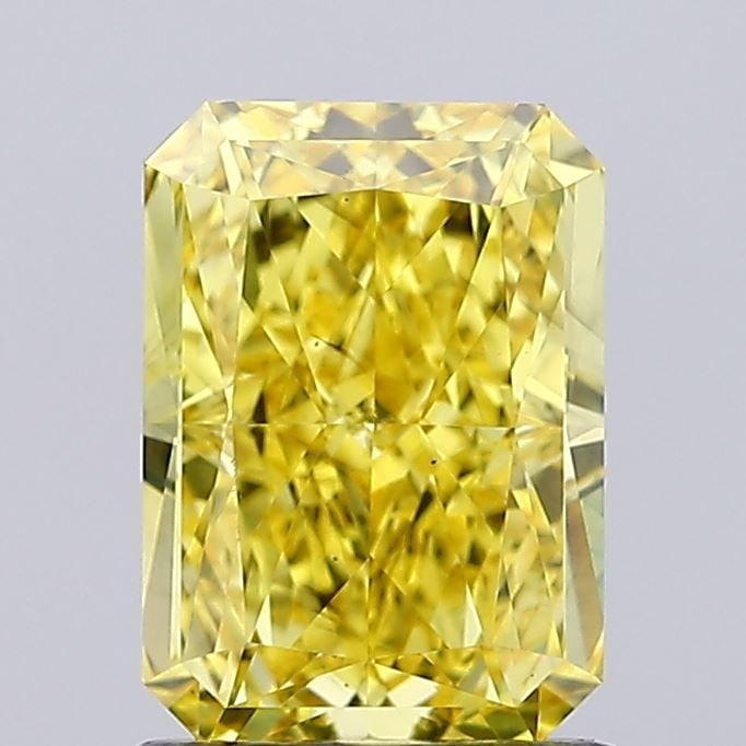 Loose Diamond - RADIANT 1.51ct Fancy Vivid Yellow VS2: Loose Diamond - RADIANT 1.51ct Fancy Vivid Yellow VS2 Source: This is a real non-mined Diamond that has been grown in a lab Shape: RADIANT Carats: 1.51 Color: Fancy Vivid Yellow Certification: IGI Vid
