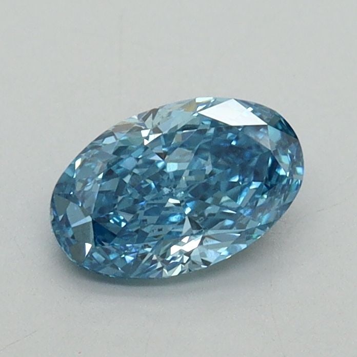 Loose Diamond - OVAL 0.62ct Fancy Vivid Blue VS2: Loose Diamond - OVAL 0.62ct Fancy Vivid Blue VS2 Source: This is a real non-mined Diamond that has been grown in a lab Shape: OVAL Carats: 0.62 Color: Fancy Vivid Blue Certification: IGI Video: