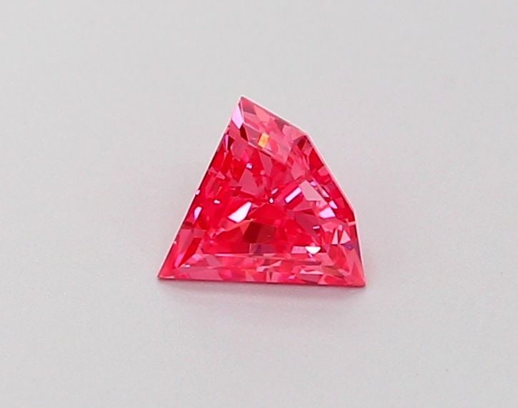 Loose Diamond - TRIANGULAR 0.21ct Fancy Vivid Pink VS1: Loose Diamond - TRIANGULAR 0.21ct Fancy Vivid Pink VS1 Source: This is a real non-mined Diamond that has been grown in a lab Shape: TRIANGULAR Carats: 0.21 Color: Fancy Vivid Pink Certification: NONE