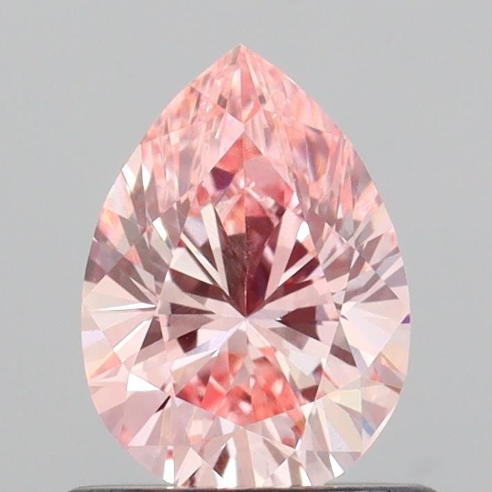 Loose Diamond - PEAR 0.69ct Fancy Vivid Pink VS2: Loose Diamond - PEAR 0.69ct Fancy Vivid Pink VS2 Source: This is a real non-mined Diamond that has been grown in a lab Shape: PEAR Carats: 0.69 Color: Fancy Vivid Pink Certification: IGI Video:
