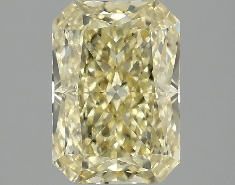 Loose Diamond - RADIANT 2.1ct Fancy Vivid Yellow VS1: Loose Diamond - RADIANT 2.1ct Fancy Vivid Yellow VS1 Source: This is a real non-mined Diamond that has been grown in a lab Shape: RADIANT Carats: 2.1 Color: Fancy Vivid Yellow Certification: IGI Video