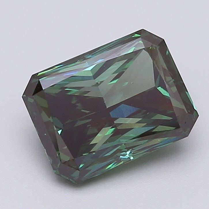 Loose Diamond - RADIANT 3.46ct Fancy Deep Green VS2: Loose Diamond - RADIANT 3.46ct Fancy Deep Green VS2 Source: This is a real non-mined Diamond that has been grown in a lab Shape: RADIANT Carats: 3.46 Color: Fancy Deep Green Certification: IGI Video: