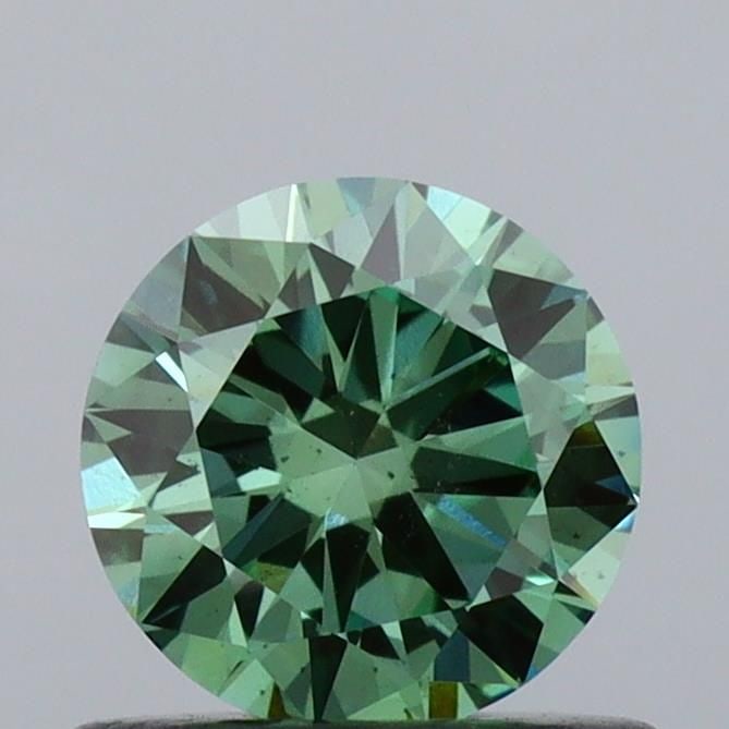 Loose Diamond - ROUND 0.6ct Fancy Vivid Green VS2: Loose Diamond - ROUND 0.6ct Fancy Vivid Green VS2 Source: This is a real non-mined Diamond that has been grown in a lab Shape: ROUND Carats: 0.6 Color: Fancy Vivid Green Certification: IGI Video: