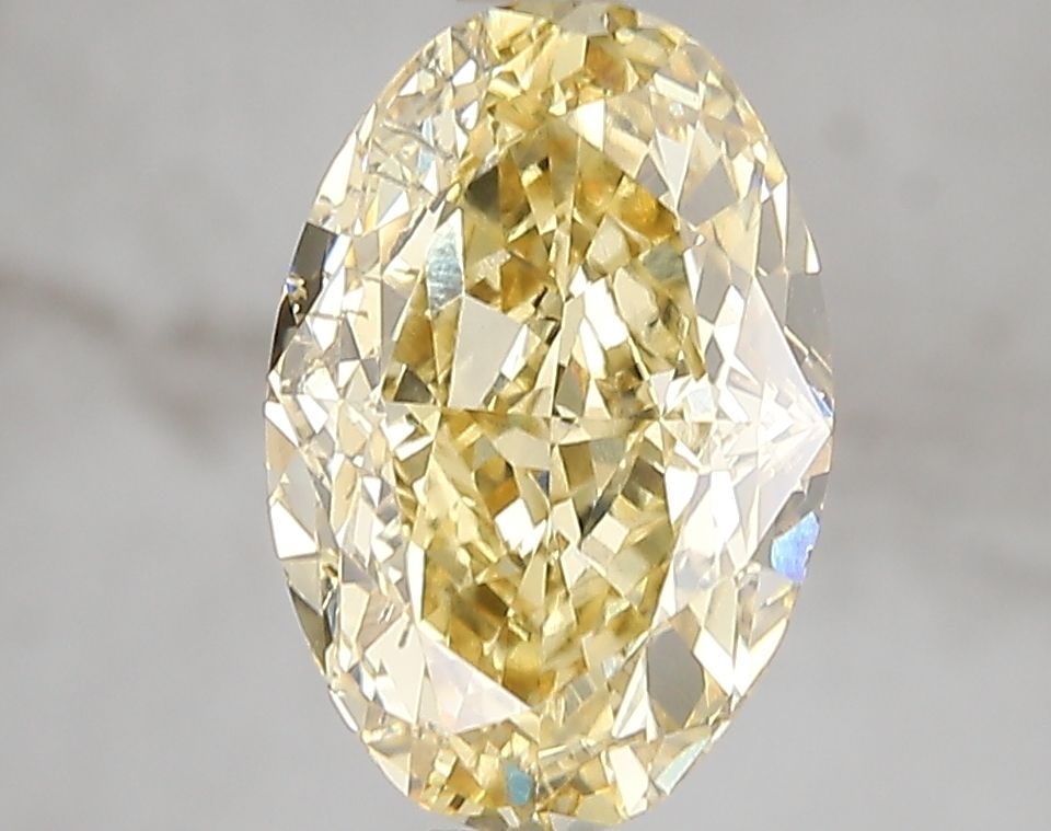 Loose Diamond - OVAL 3.03ct Fancy Intense Yellow VS2: Loose Diamond - OVAL 3.03ct Fancy Intense Yellow VS2 Source: This is a real non-mined Diamond that has been grown in a lab Shape: OVAL Carats: 3.03 Color: Fancy Intense Yellow Certification: IGI Video