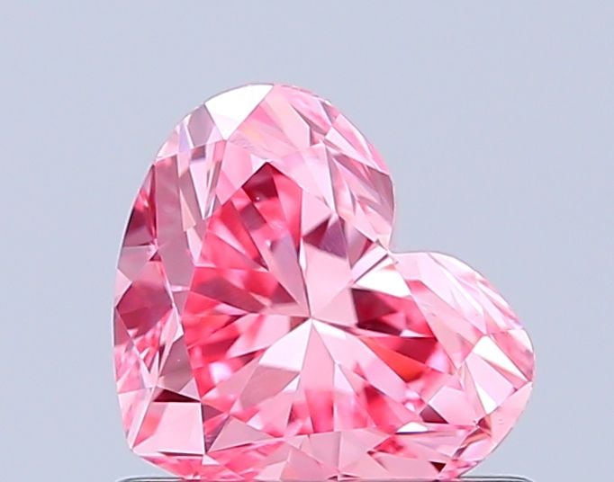 Loose Diamond - HEART 0.75ct Fancy Vivid Pink VVS2: Loose Diamond - HEART 0.75ct Fancy Vivid Pink VVS2 Source: This is a real non-mined Diamond that has been grown in a lab Shape: HEART Carats: 0.75 Color: Fancy Vivid Pink Certification: IGI Video: