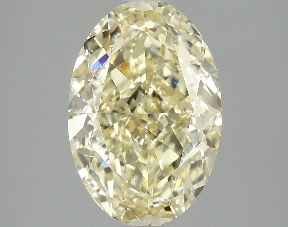 Loose Diamond - OVAL 3.01ct Fancy Vivid Yellow VS2: Loose Diamond - OVAL 3.01ct Fancy Vivid Yellow VS2 Source: This is a real non-mined Diamond that has been grown in a lab Shape: OVAL Carats: 3.01 Color: Fancy Vivid Yellow Certification: IGI Video: