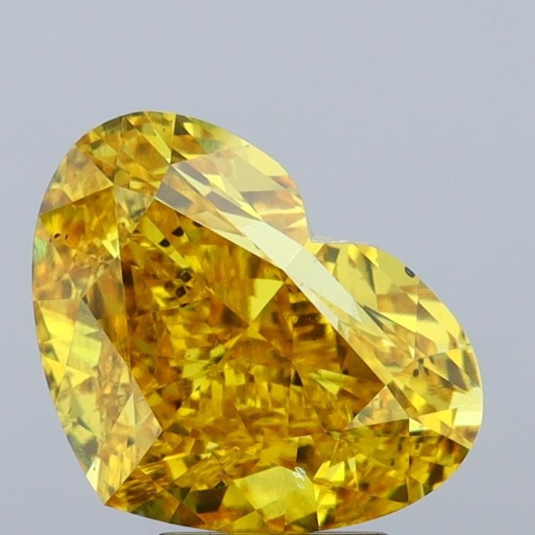 Loose Diamond - HEART 5.01ct Fancy Vivid Yellow SI1: Loose Diamond - HEART 5.01ct Fancy Vivid Yellow SI1 Source: This is a real non-mined Diamond that has been grown in a lab Shape: HEART Carats: 5.01 Color: Fancy Vivid Yellow Certification: IGI Video: