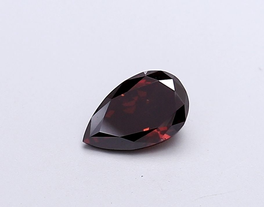 Loose Diamond - PEAR 0.59ct Fancy Deep Orange VS1: Loose Diamond - PEAR 0.59ct Fancy Deep Orange VS1 Source: This is a real non-mined Diamond that has been grown in a lab Shape: PEAR Carats: 0.59 Color: Fancy Deep Orange Certification: IGI Video: