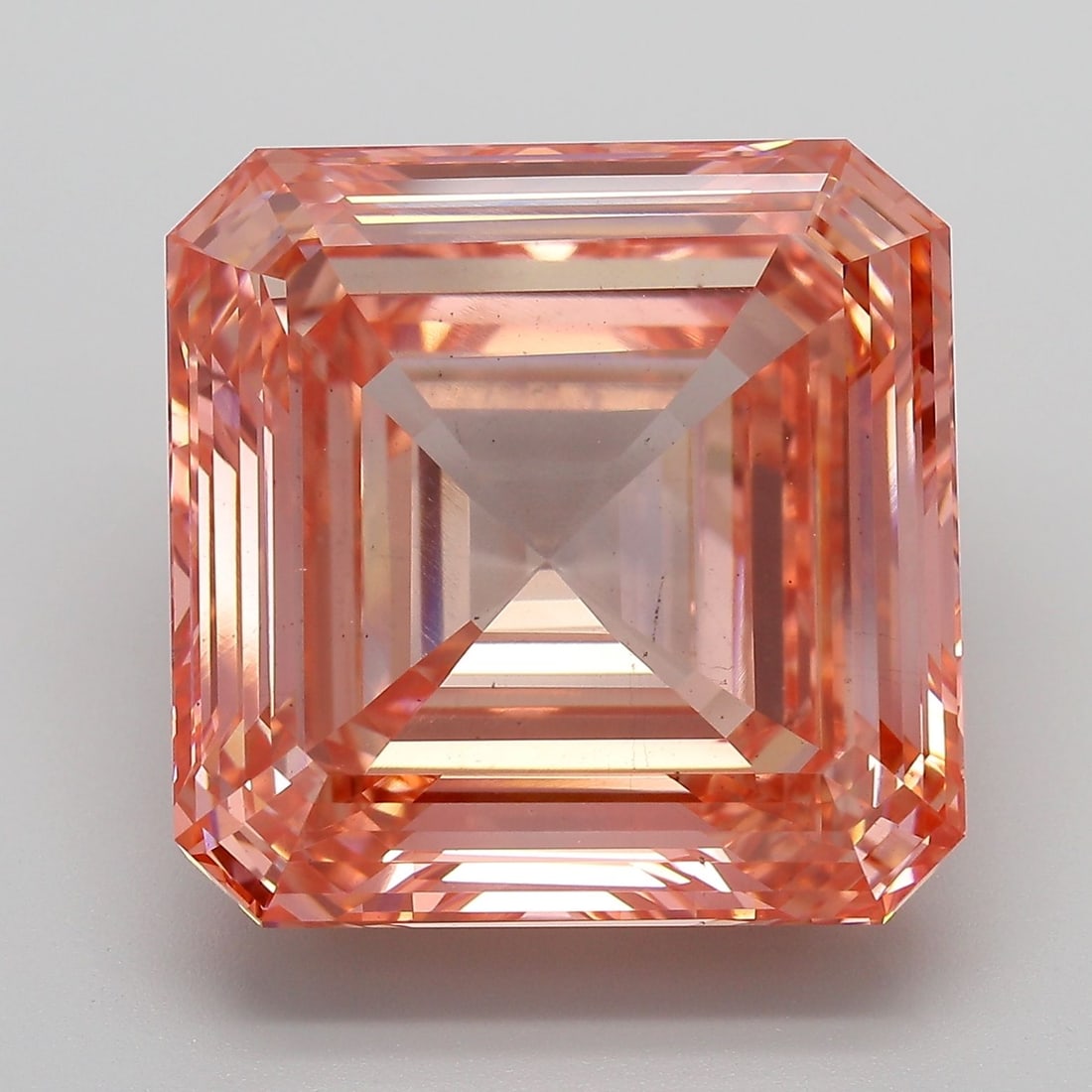 Loose Diamond - SQUARE EMERALD 21.58ct Fancy Vivid Pink VS2: Loose Diamond - SQUARE EMERALD 21.58ct Fancy Vivid Pink VS2 Source: This is a real non-mined Diamond that has been grown in a lab Shape: SQUARE EMERALD Carats: 21.58 Color: Fancy Vivid Pink Certificat
