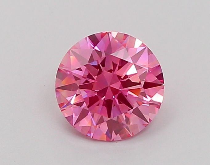 Loose Diamond - ROUND 1.07ct Fancy Vivid Pink VS1: Loose Diamond - ROUND 1.07ct Fancy Vivid Pink VS1 Source: This is a real non-mined Diamond that has been grown in a lab Shape: ROUND Carats: 1.07 Color: Fancy Vivid Pink Certification: IGI Video:
