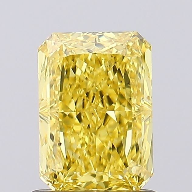 Loose Diamond - RADIANT 1.01ct Fancy Vivid Yellow VS2: Loose Diamond - RADIANT 1.01ct Fancy Vivid Yellow VS2 Source: This is a real non-mined Diamond that has been grown in a lab Shape: RADIANT Carats: 1.01 Color: Fancy Vivid Yellow Certification: IGI Vid