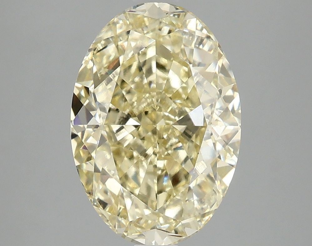 Loose Diamond - OVAL 4.1ct Fancy Vivid Yellow VS1: Loose Diamond - OVAL 4.1ct Fancy Vivid Yellow VS1 Source: This is a real non-mined Diamond that has been grown in a lab Shape: OVAL Carats: 4.1 Color: Fancy Vivid Yellow Certification: IGI Video: