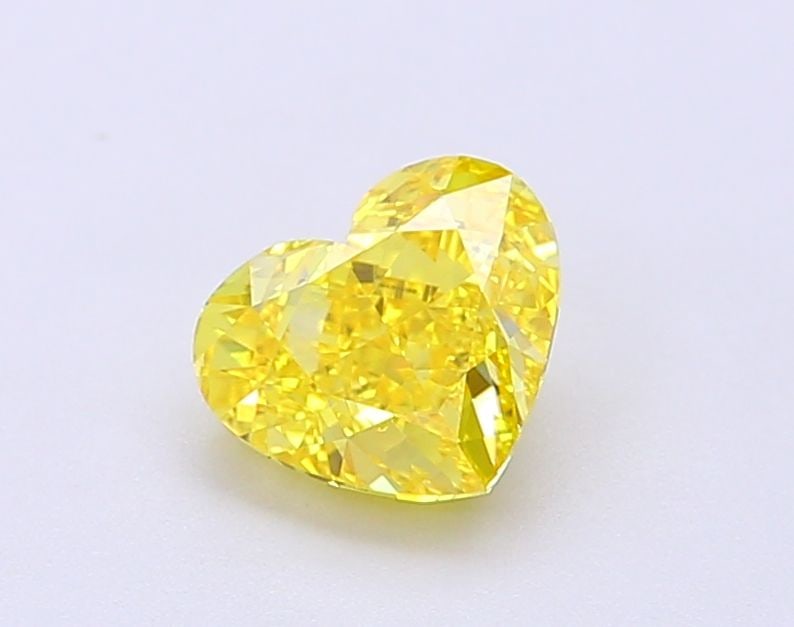 Loose Diamond - HEART 1.06ct Fancy Vivid Yellow VVS2: Loose Diamond - HEART 1.06ct Fancy Vivid Yellow VVS2 Source: This is a real non-mined Diamond that has been grown in a lab Shape: HEART Carats: 1.06 Color: Fancy Vivid Yellow Certification: IGI Video: