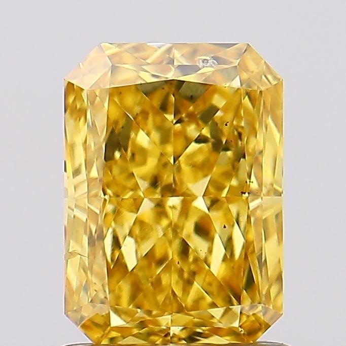 Loose Diamond - RADIANT 1.27ct Fancy Vivid Yellow VS2: Loose Diamond - RADIANT 1.27ct Fancy Vivid Yellow VS2 Source: This is a real non-mined Diamond that has been grown in a lab Shape: RADIANT Carats: 1.27 Color: Fancy Vivid Yellow Certification: IGI Vid