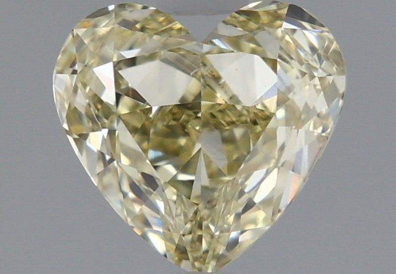 Loose Diamond - HEART 1.4ct Fancy Yellow VVS2: Loose Diamond - HEART 1.4ct Fancy Yellow VVS2 Source: This is a real non-mined Diamond that has been grown in a lab Shape: HEART Carats: 1.4 Color: Fancy Yellow Certification: IGI Video: