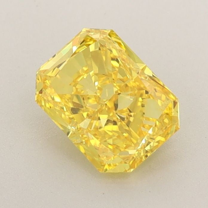 Loose Diamond - RADIANT 0.9ct Fancy Vivid Yellow VVS2: Loose Diamond - RADIANT 0.9ct Fancy Vivid Yellow VVS2 Source: This is a real non-mined Diamond that has been grown in a lab Shape: RADIANT Carats: 0.9 Color: Fancy Vivid Yellow Certification: IGI Vide