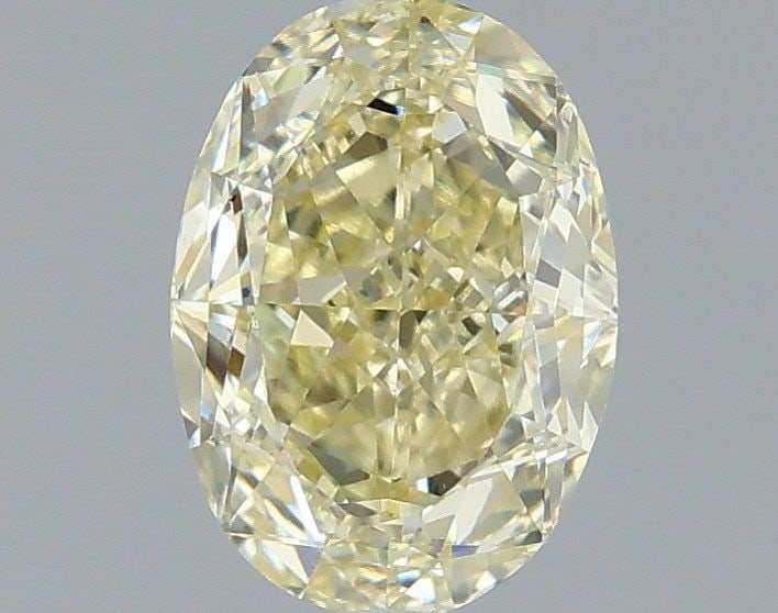 Loose Diamond - OVAL 1.07ct Fancy Light Yellow VS1: Loose Diamond - OVAL 1.07ct Fancy Light Yellow VS1 Source: This is a real non-mined Diamond that has been grown in a lab Shape: OVAL Carats: 1.07 Color: Fancy Light Yellow Certification: IGI Video: