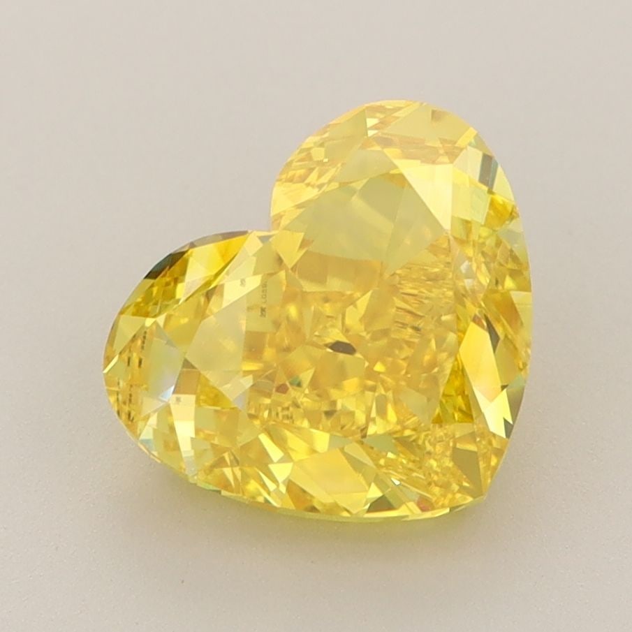 Loose Diamond - HEART 3.1ct Fancy Vivid Yellow VVS2: Loose Diamond - HEART 3.1ct Fancy Vivid Yellow VVS2 Source: This is a real non-mined Diamond that has been grown in a lab Shape: HEART Carats: 3.1 Color: Fancy Vivid Yellow Certification: IGI Video: