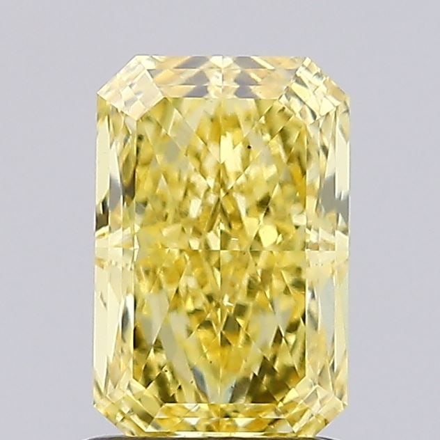 Loose Diamond - RADIANT 1.35ct Fancy Vivid Yellow VS2: Loose Diamond - RADIANT 1.35ct Fancy Vivid Yellow VS2 Source: This is a real non-mined Diamond that has been grown in a lab Shape: RADIANT Carats: 1.35 Color: Fancy Vivid Yellow Certification: IGI Vid