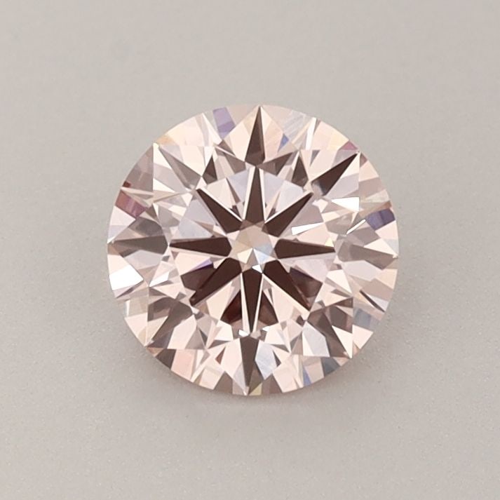 Ideal Loose Diamond - ROUND 0.72ct Fancy Pink VVS2: Ideal Loose Diamond - ROUND 0.72ct Fancy Pink VVS2 Source: This is a real non-mined Diamond that has been grown in a lab Shape: ROUND Carats: 0.72 Color: Fancy Pink Certification: IGI Video: