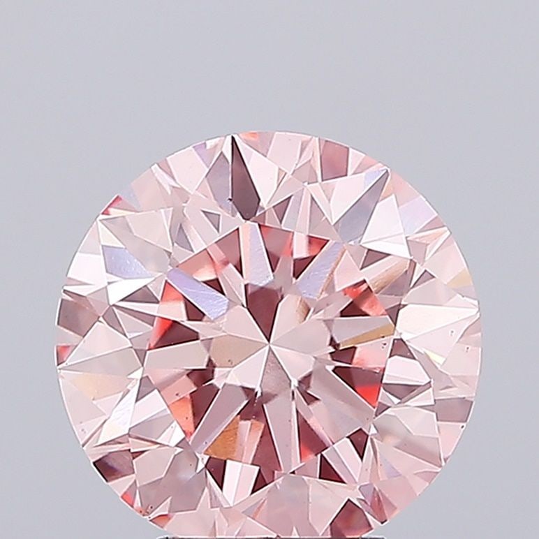 Loose Diamond - ROUND 5.02ct Fancy Vivid Pink VS1: Loose Diamond - ROUND 5.02ct Fancy Vivid Pink VS1 Source: This is a real non-mined Diamond that has been grown in a lab Shape: ROUND Carats: 5.02 Color: Fancy Vivid Pink Certification: IGI Video: