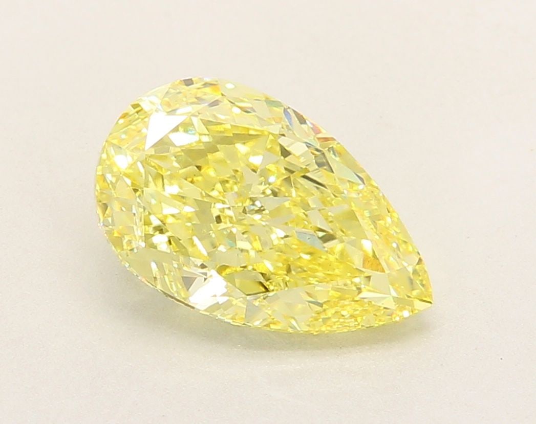 Loose Diamond - PEAR 3.11ct Fancy Intense Yellow VS1: Loose Diamond - PEAR 3.11ct Fancy Intense Yellow VS1 Source: This is a real non-mined Diamond that has been grown in a lab Shape: PEAR Carats: 3.11 Color: Fancy Intense Yellow Certification: IGI Video