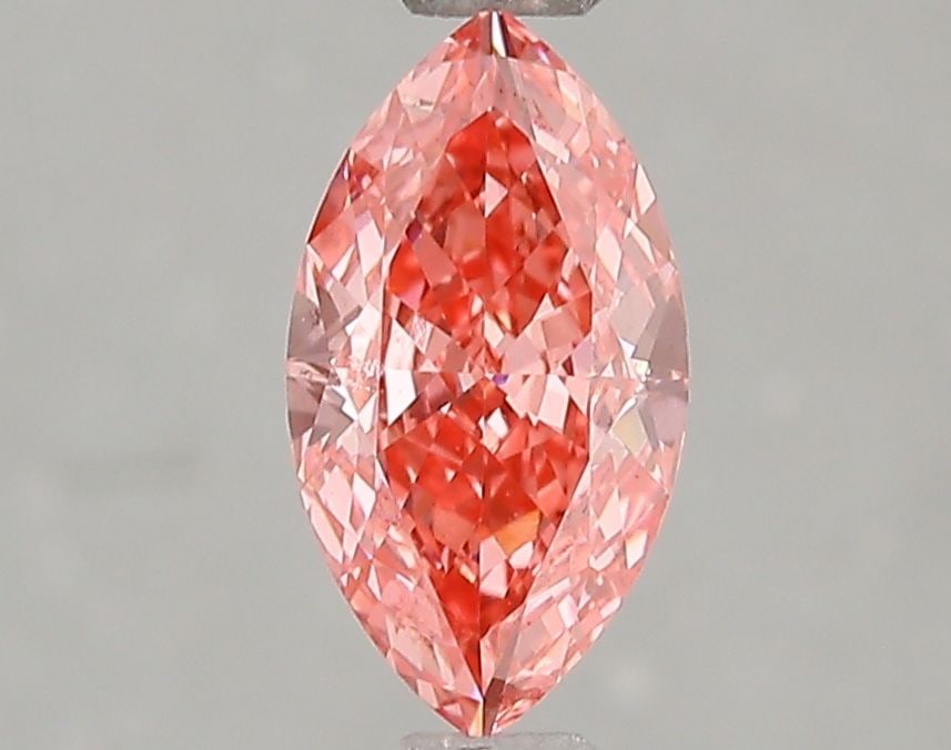 Loose Diamond - MARQUISE 1.03ct Fancy Vivid Pink VS2: Loose Diamond - MARQUISE 1.03ct Fancy Vivid Pink VS2 Source: This is a real non-mined Diamond that has been grown in a lab Shape: MARQUISE Carats: 1.03 Color: Fancy Vivid Pink Certification: IGI Video