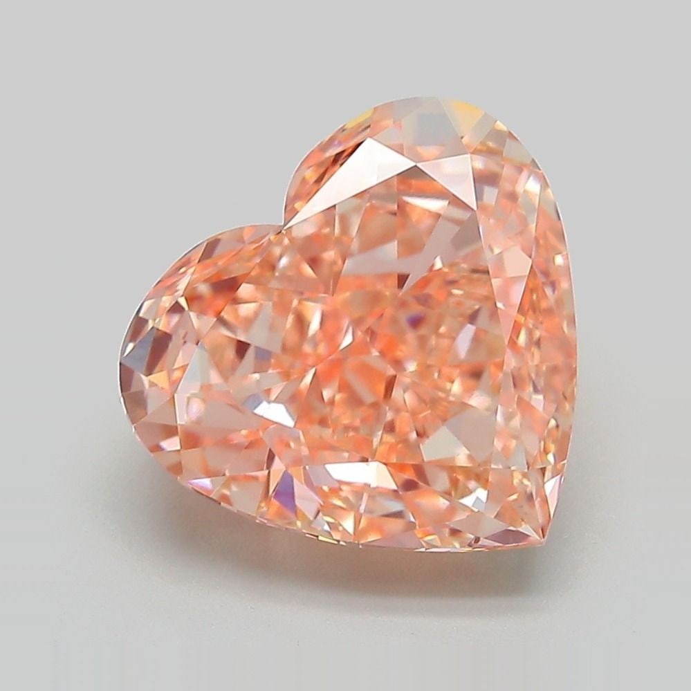 Loose Diamond - HEART 5.31ct Fancy Vivid Pinkish Orange VVS2: Loose Diamond - HEART 5.31ct Fancy Vivid Pinkish Orange VVS2 Source: This is a real non-mined Diamond that has been grown in a lab Shape: HEART Carats: 5.31 Color: Fancy Vivid Pinkish Orange Certifica
