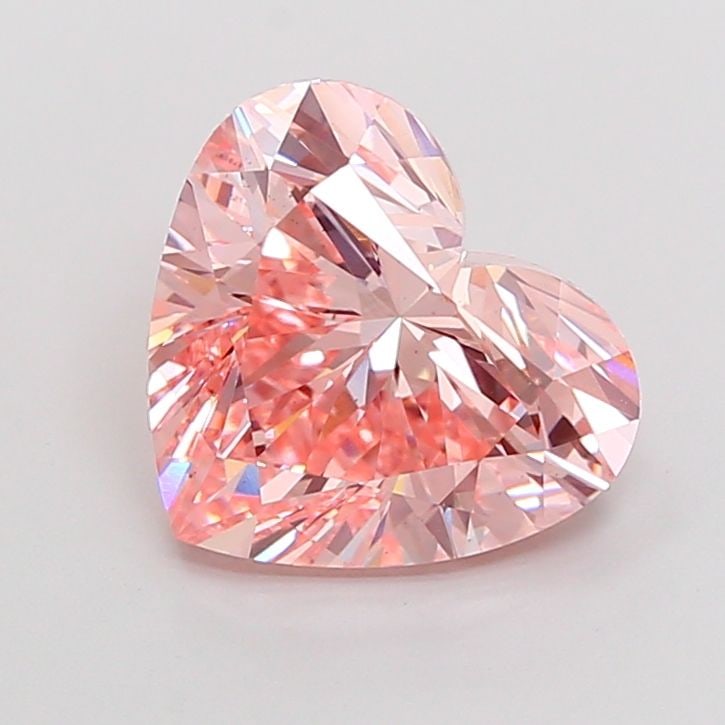 Loose Diamond - HEART 5.0ct Fancy Vivid Pink VS2: Loose Diamond - HEART 5.0ct Fancy Vivid Pink VS2 Source: This is a real non-mined Diamond that has been grown in a lab Shape: HEART Carats: 5.0 Color: Fancy Vivid Pink Certification: IGI Video:
