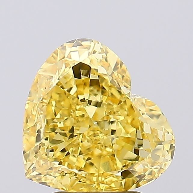 Loose Diamond - HEART 3.53ct Fancy Vivid Yellow VS2: Loose Diamond - HEART 3.53ct Fancy Vivid Yellow VS2 Source: This is a real non-mined Diamond that has been grown in a lab Shape: HEART Carats: 3.53 Color: Fancy Vivid Yellow Certification: IGI Video: