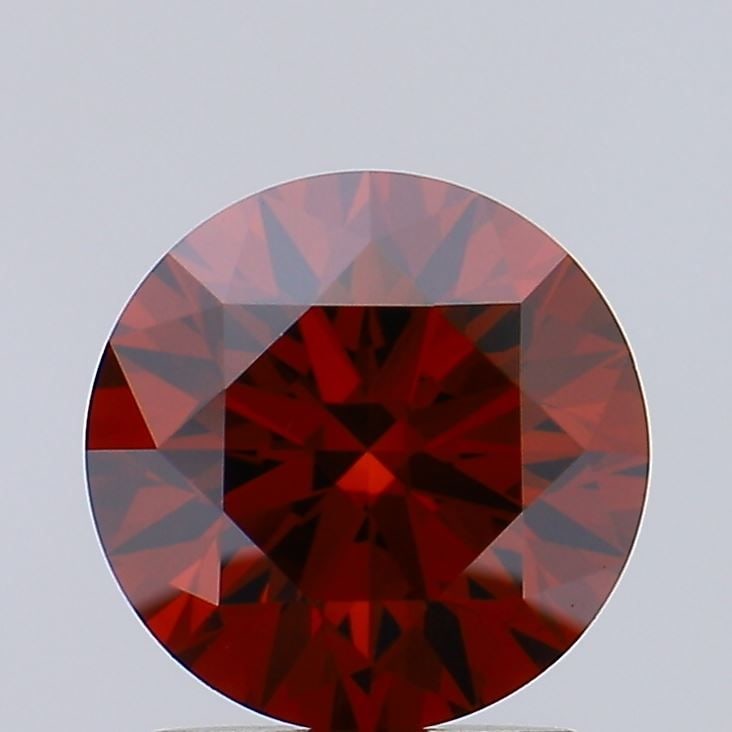 Loose Diamond - ROUND 1.5ct Fancy Deep Orange VS1: Loose Diamond - ROUND 1.5ct Fancy Deep Orange VS1 Source: This is a real non-mined Diamond that has been grown in a lab Shape: ROUND Carats: 1.5 Color: Fancy Deep Orange Certification: IGI Video: