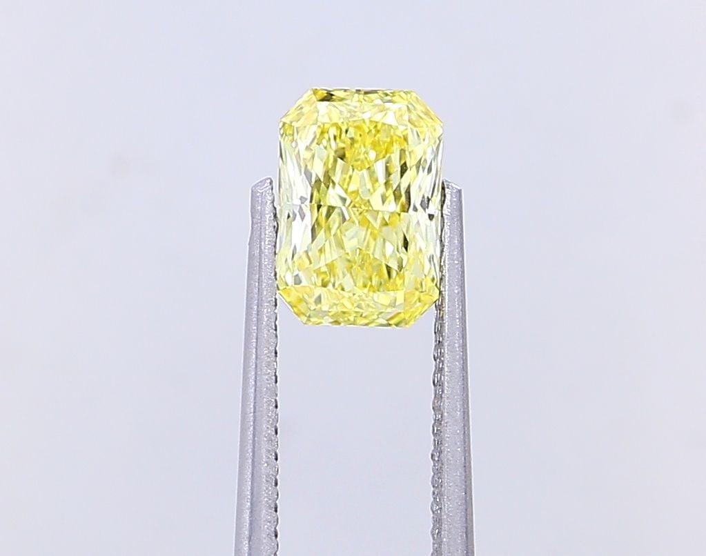 Loose Diamond - RADIANT 1.07ct Fancy Intense Yellow VVS2: Loose Diamond - RADIANT 1.07ct Fancy Intense Yellow VVS2 Source: This is a real non-mined Diamond that has been grown in a lab Shape: RADIANT Carats: 1.07 Color: Fancy Intense Yellow Certification: IG