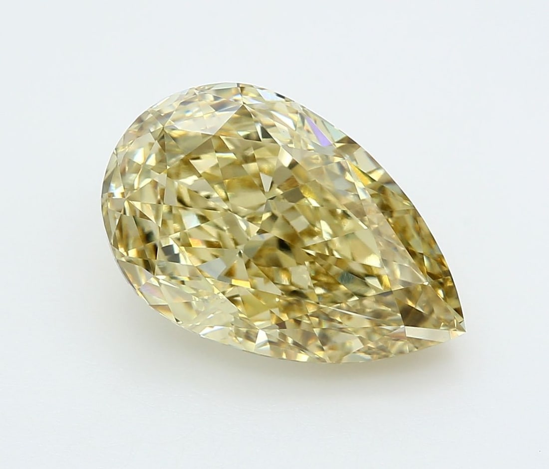 Loose Diamond - PEAR 7.08ct Fancy Yellow VVS2: Loose Diamond - PEAR 7.08ct Fancy Yellow VVS2 Source: This is a real non-mined Diamond that has been grown in a lab Shape: PEAR Carats: 7.08 Color: Fancy Yellow Certification: IGI Video: Video Link 