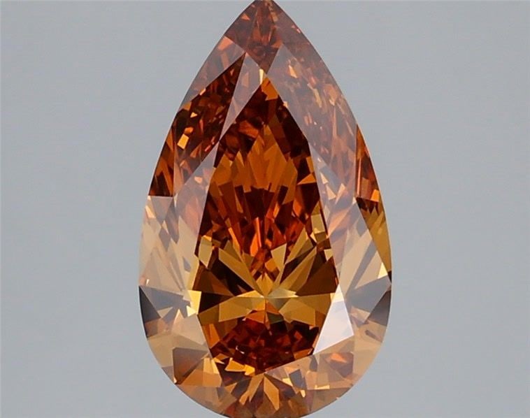 Loose Diamond - PEAR 2.07ct Fancy Vivid Brownish Orange VVS2: Loose Diamond - PEAR 2.07ct Fancy Vivid Brownish Orange VVS2 Source: This is a real non-mined Diamond that has been grown in a lab Shape: PEAR Carats: 2.07 Color: Fancy Vivid Brownish Orange Certifica
