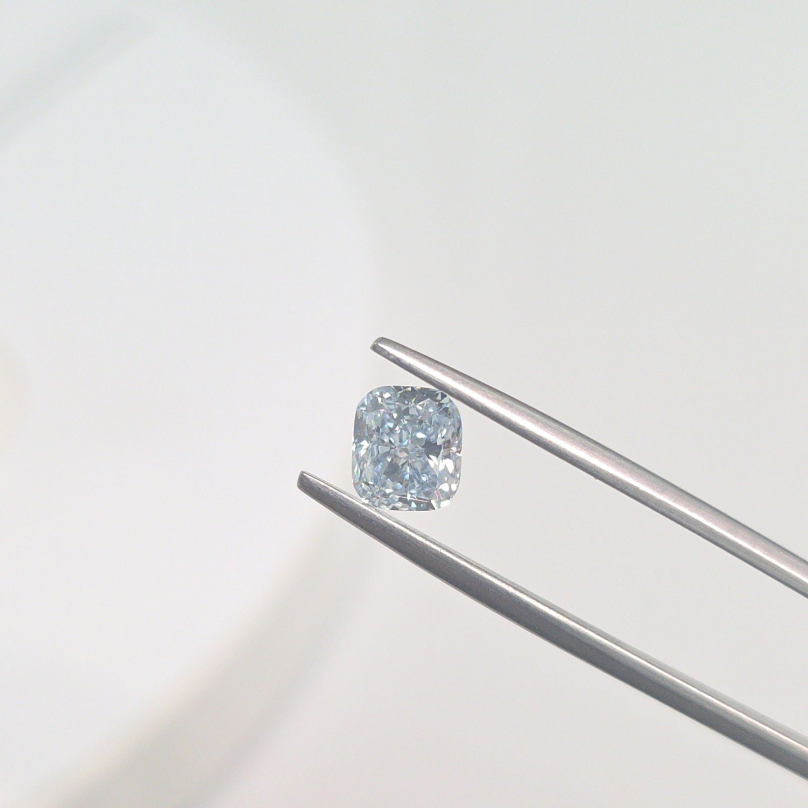 Loose Diamond - CUSHION MODIFIED 1.11ct Fancy Blue VVS2: Loose Diamond - CUSHION MODIFIED 1.11ct Fancy Blue VVS2 Source: This is a real non-mined Diamond that has been grown in a lab Shape: CUSHION MODIFIED Carats: 1.11 Color: Fancy Blue Certification: IGI