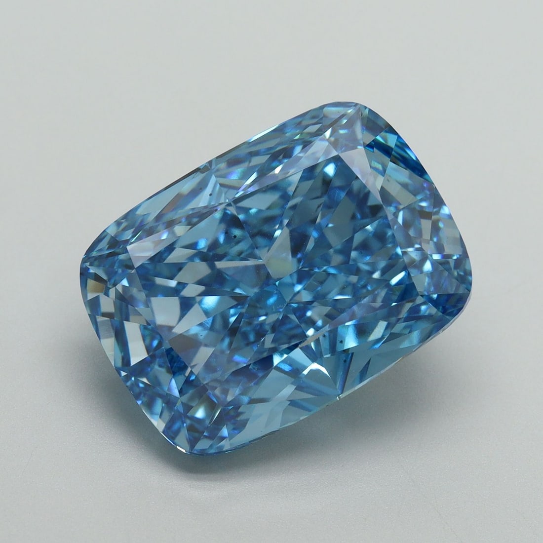 Loose Diamond - CUSHION MODIFIED 11.55ct Fancy Vivid Blue VS2: Loose Diamond - CUSHION MODIFIED 11.55ct Fancy Vivid Blue VS2 Source: This is a real non-mined Diamond that has been grown in a lab Shape: CUSHION MODIFIED Carats: 11.55 Color: Fancy Vivid Blue Certif