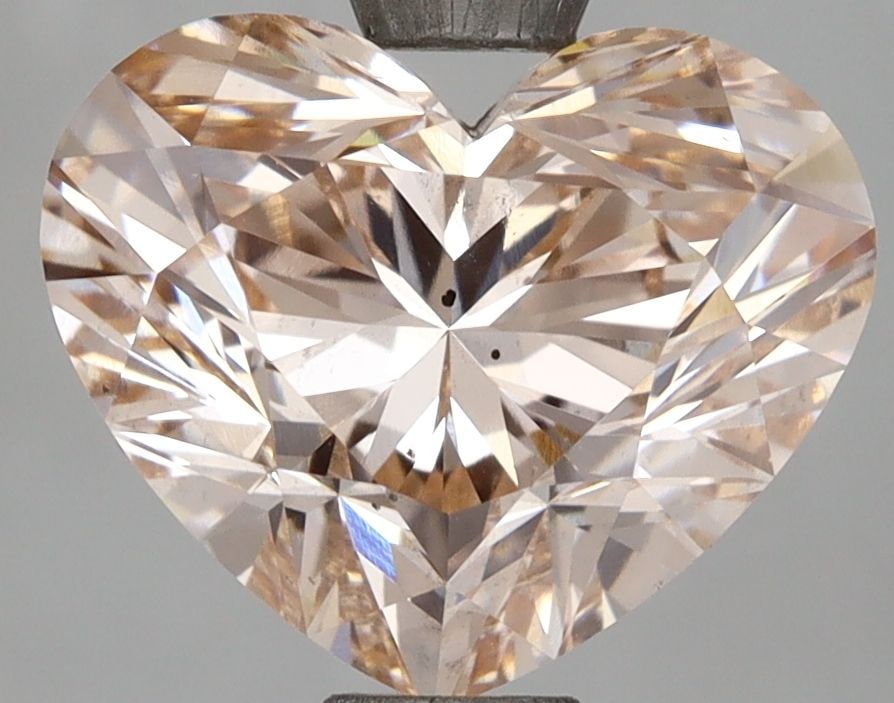 Loose Diamond - HEART 3.04ct Fancy Vivid Pink SI1: Loose Diamond - HEART 3.04ct Fancy Vivid Pink SI1 Source: This is a real non-mined Diamond that has been grown in a lab Shape: HEART Carats: 3.04 Color: Fancy Vivid Pink Certification: NONE Video: