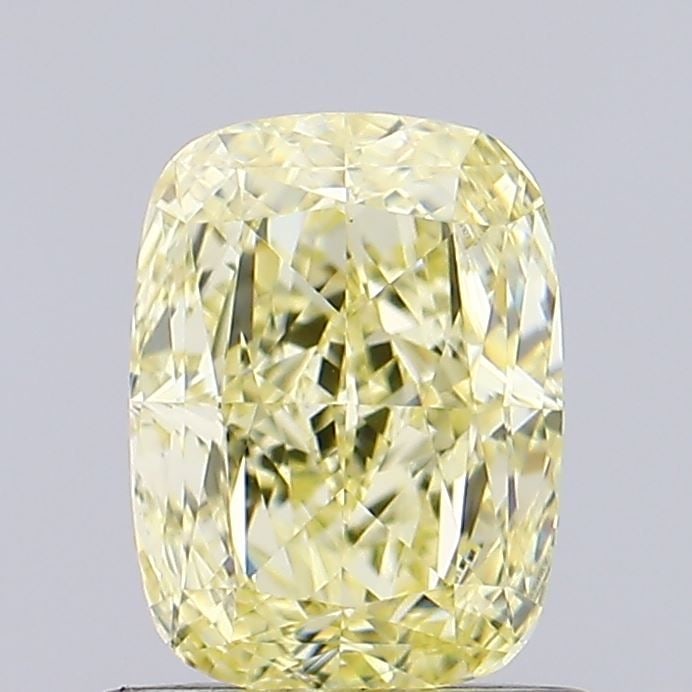 Loose Diamond - CUSHION MODIFIED 0.94ct Fancy Yellow VVS2: Loose Diamond - CUSHION MODIFIED 0.94ct Fancy Yellow VVS2 Source: This is a real non-mined Diamond that has been grown in a lab Shape: CUSHION MODIFIED Carats: 0.94 Color: Fancy Yellow Certification: