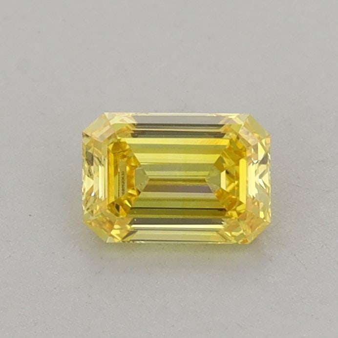 Loose Diamond - EMERALD 0.47ct Fancy Vivid Yellow VS1: Loose Diamond - EMERALD 0.47ct Fancy Vivid Yellow VS1 Source: This is a real non-mined Diamond that has been grown in a lab Shape: EMERALD Carats: 0.47 Color: Fancy Vivid Yellow Certification: IGI Vid