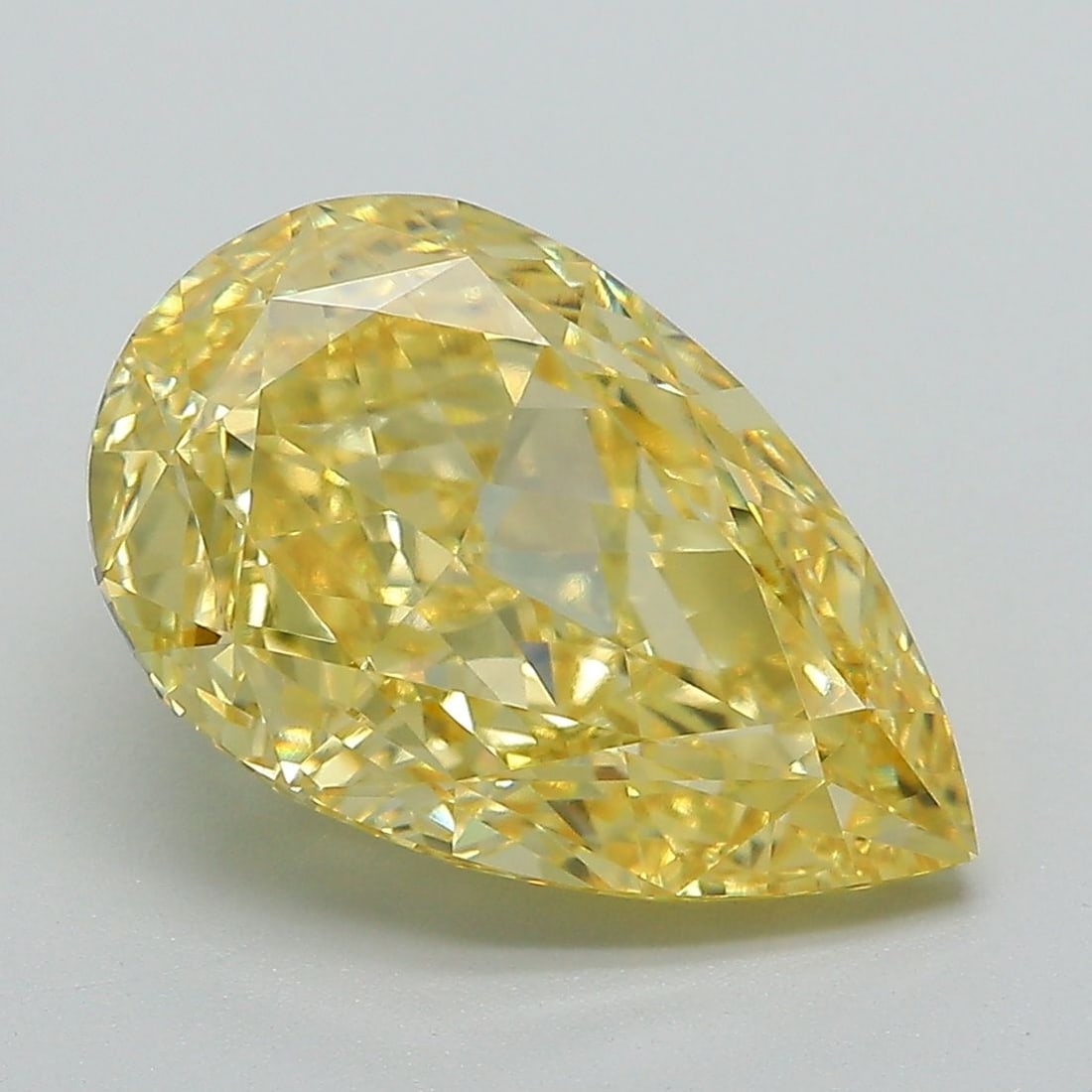 Loose Diamond - PEAR 5.26ct Fancy Vivid Yellow VVS1: Loose Diamond - PEAR 5.26ct Fancy Vivid Yellow VVS1 Source: This is a real non-mined Diamond that has been grown in a lab Shape: PEAR Carats: 5.26 Color: Fancy Vivid Yellow Certification: IGI Video: