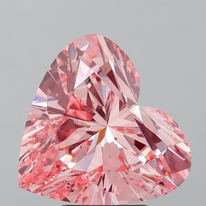 Loose Diamond - HEART 5.01ct Fancy Vivid Pink VS1: Loose Diamond - HEART 5.01ct Fancy Vivid Pink VS1 Source: This is a real non-mined Diamond that has been grown in a lab Shape: HEART Carats: 5.01 Color: Fancy Vivid Pink Certification: IGI Video: