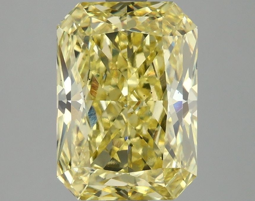 Loose Diamond - RADIANT 3.1ct Fancy Vivid Yellow VS2: Loose Diamond - RADIANT 3.1ct Fancy Vivid Yellow VS2 Source: This is a real non-mined Diamond that has been grown in a lab Shape: RADIANT Carats: 3.1 Color: Fancy Vivid Yellow Certification: IGI Video