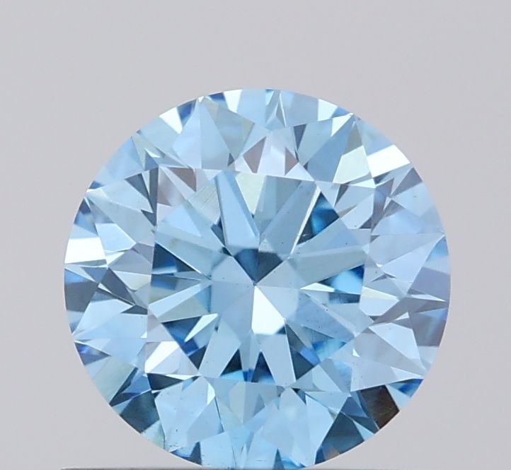 Ideal Loose Diamond - ROUND 0.74ct Fancy Vivid Blue VS1: Ideal Loose Diamond - ROUND 0.74ct Fancy Vivid Blue VS1 Source: This is a real non-mined Diamond that has been grown in a lab Shape: ROUND Carats: 0.74 Color: Fancy Vivid Blue Certification: IGI