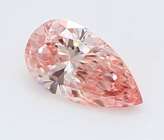 Loose Diamond - PEAR 0.18ct Fancy Vivid Pink VS1: Loose Diamond - PEAR 0.18ct Fancy Vivid Pink VS1 Source: This is a real non-mined Diamond that has been grown in a lab Shape: PEAR Carats: 0.18 Color: Fancy Vivid Pink Certification: IGI Video:
