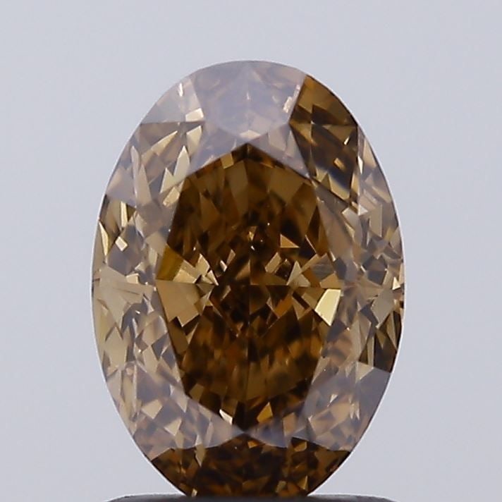 Loose Diamond - OVAL 1.3ct Fancy Brown VVS2: Loose Diamond - OVAL 1.3ct Fancy Brown VVS2 Source: This is a real non-mined Diamond that has been grown in a lab Shape: OVAL Carats: 1.3 Color: Fancy Brown Certification: IGI Video: